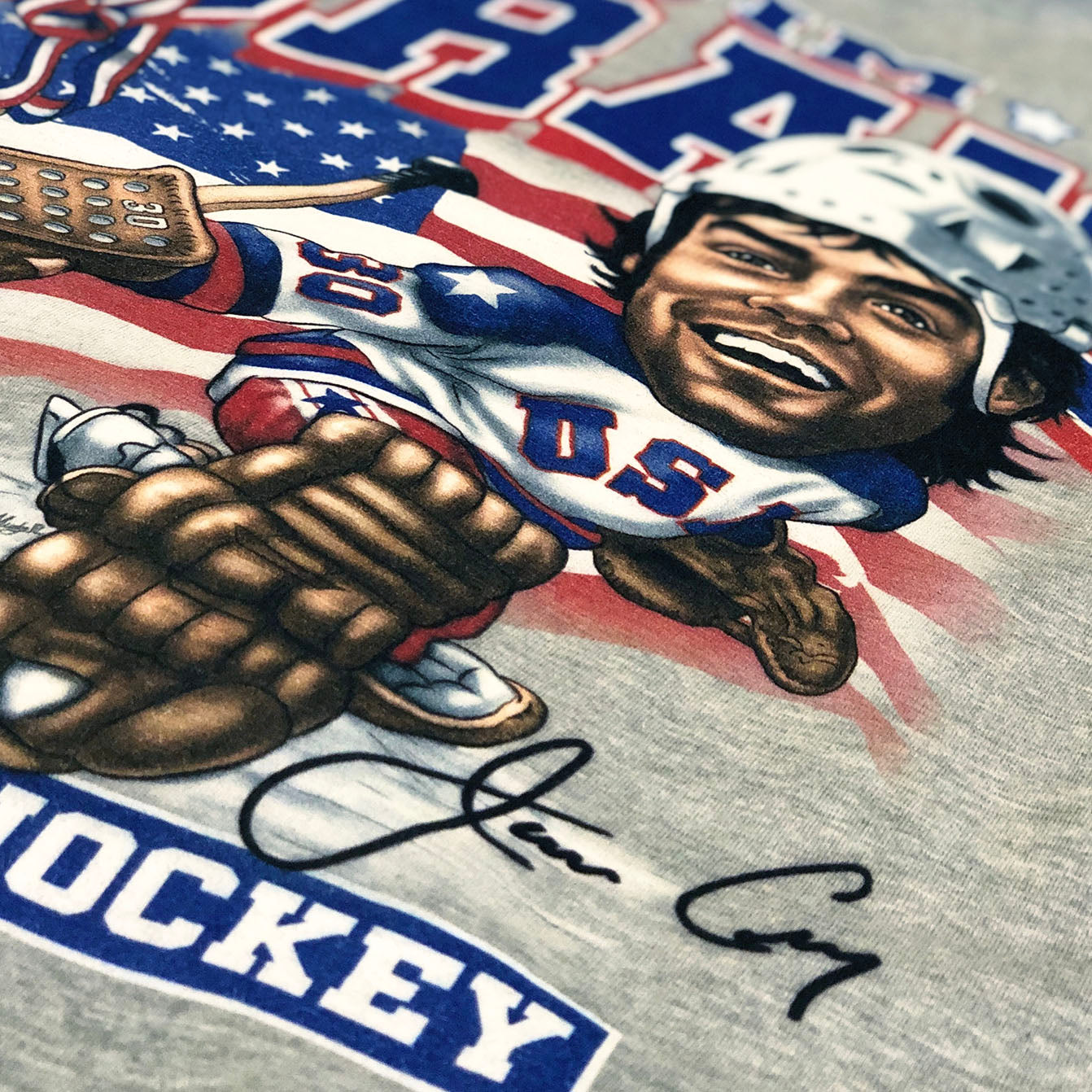 1980 Jim Craig Miracle On Ice™ Caricature Tee - Streaker Sports